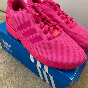 Pink Adidas for women or men